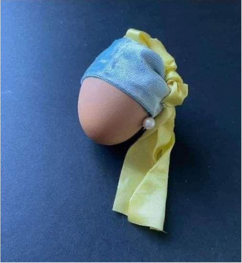 Afbeelding van een ei in voorstelling van 'Het meisje met de parel'